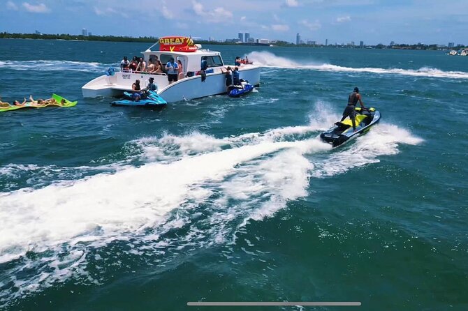 3 Hour Party Boat Jet ski Banana Tube and open bar in Miami - The scenic cruise: Star Island, Miami Beach, Fisher Island, and more