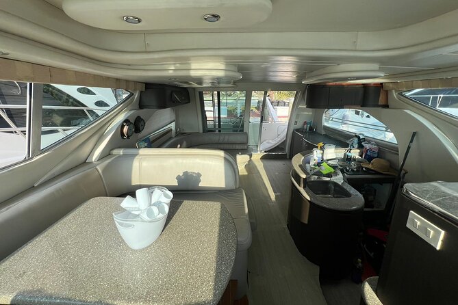 50ft Miller Blue | Miami Yacht Rental | 3 to 6 Hours | 13 Ppl - Onboard comfort: Bluetooth sound, restroom access, and cold drinks