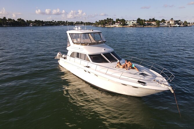 52' Yacht Rental in Miami Beach with Experienced Captain - Miami shoreline views: South Beach, Downtown, Brickell, and celebrity homes