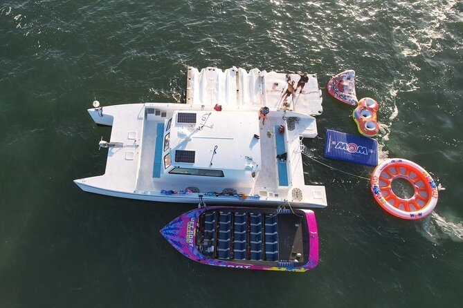 Aquatic Adventure: Boat Tour with Jetskis, Tubing, and Open Bar - 360 tubing and the water mat: the safer way to keep the fun level high