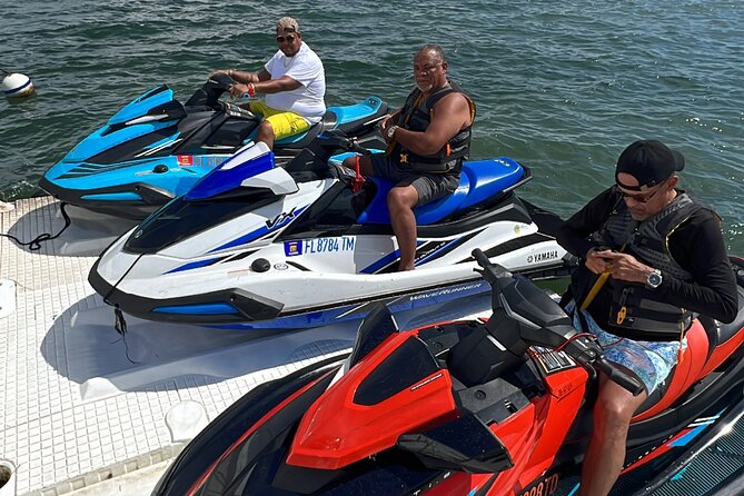 Aquatic Adventure: Boat Tour with Jetskis, Tubing, and Open Bar - The party platform: where the tour turns social
