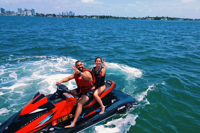 Aquatic Adventure: Boat Tour with Jetskis, Tubing, and Open Bar - The boating setup: catamaran sightseeing plus a chosen water-activity block