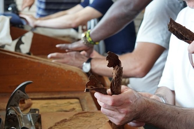 Cigar Factory Tour in Little Havana, Miami - Twisting, binding, pressing, rolling, repeat