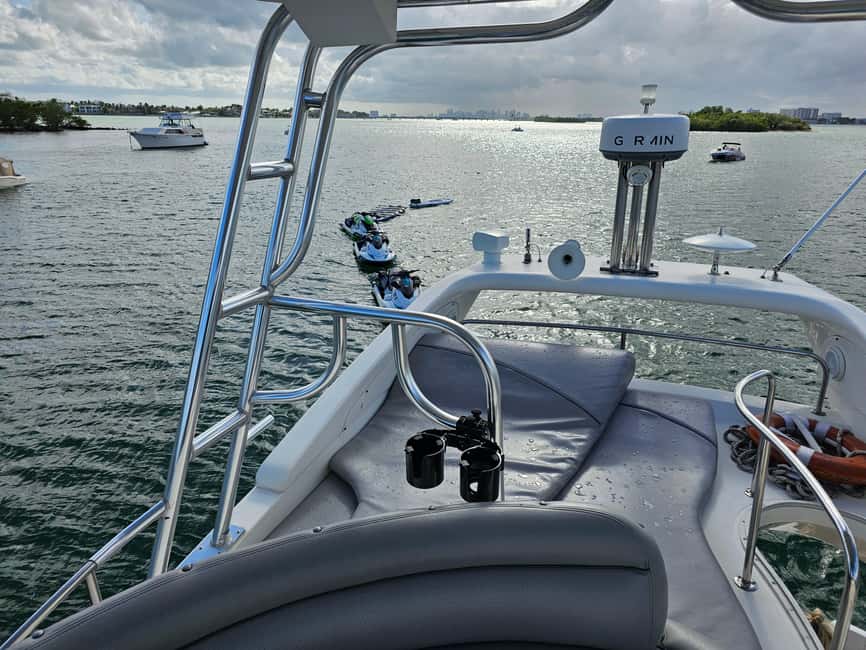 From North Bay Village: Private Boat Party with Champagne - Group Size and Comfort for Up to 13