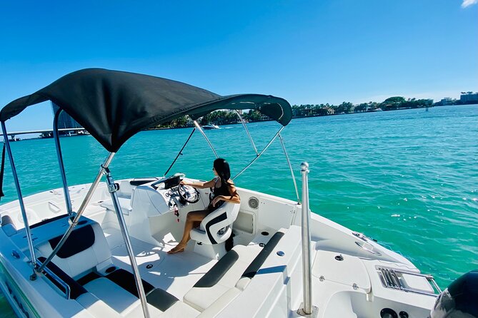 Fun Boat Rental with Captain in Miami Beach - up to 6 people - On-Board Comfort: Bluetooth, Cooler, Floating Mat, and Sound