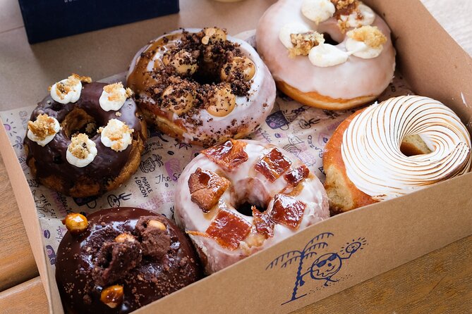 Handcrafted Donuts & Street Art: Wynwood's Most Unique Food Tour - Stop 3: 1-800-Lucky, Snacks, and a Graffiti Demonstration