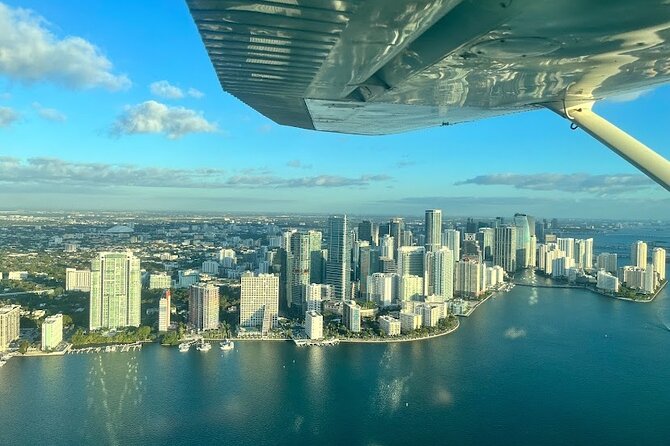 Miami Beach: Luxury Plane Tour with Free Champagne - Your aerial itinerary: Miami Beach, Key Biscayne, Fisher Island, and Port of Miami