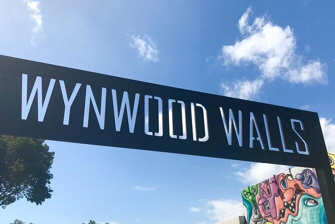 Miami City Tour and Boat Tour - Land & Sea Combo - Versace Mansion and Wynwood Walls: fashion history meets street art