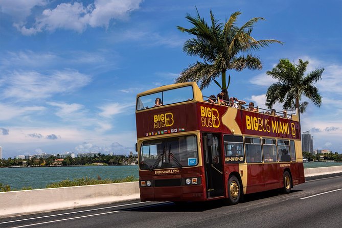 Miami: Hop-on Hop-off Tour + Cruise & Free 1-Hour Bike Rental - Open-Top Comfort: Headphones, Wind, Heat, and Rain Strategies