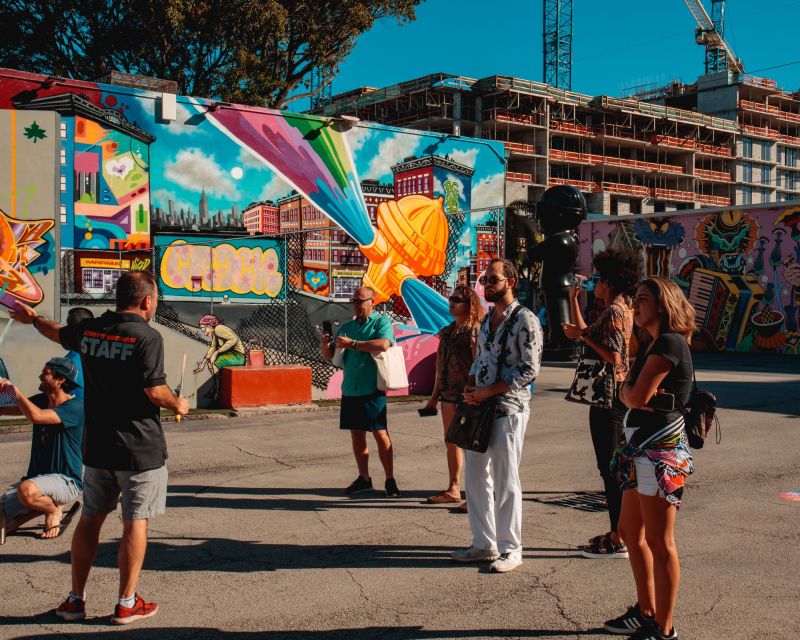 Miami: Wynwood Walls Street Art and Food Walking Tour - The mural route: Giant Beetle, Marketplace, and the Messi portrait