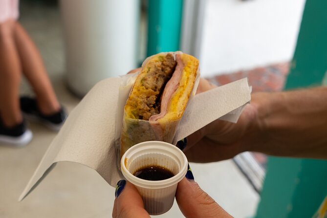 Savor South Beach: A Meal & Cultural Discovery - Your guide and why the pacing feels relaxed