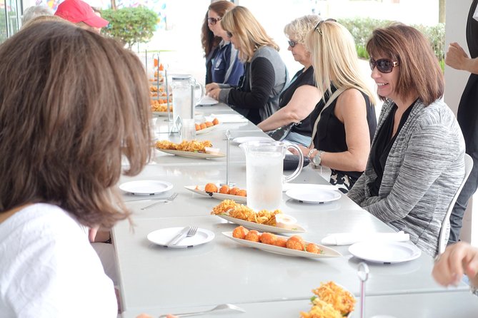 Wynwood Walls Art District Food Tour - Stop 1 in Wynwood: murals on public walls and the story behind them